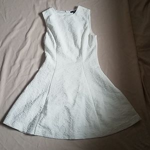 Simple white dress with interesting details
